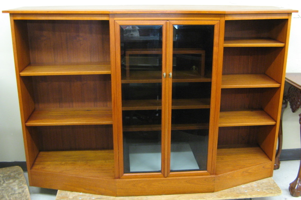 Appraisal: MODERN TEAKWOOD COMPONENT CABINET BOOKCASE featuring an off-center sound components