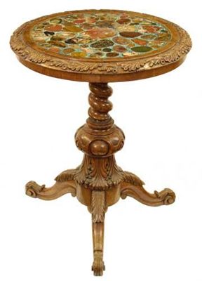 Appraisal: A Victorian carved walnut tripod table the circular top inset