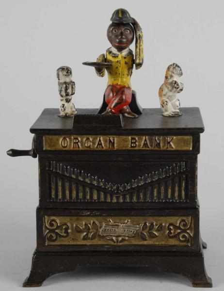 Appraisal: Cast Iron Organ Cat Dancing Dog Mechanical Bank Description Working