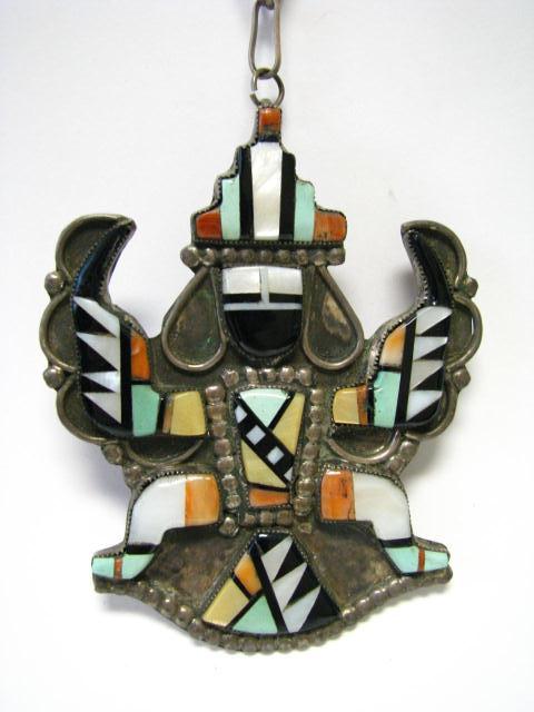 Appraisal: Sterling silver and inlaid figural pendant depicting The Bird Man