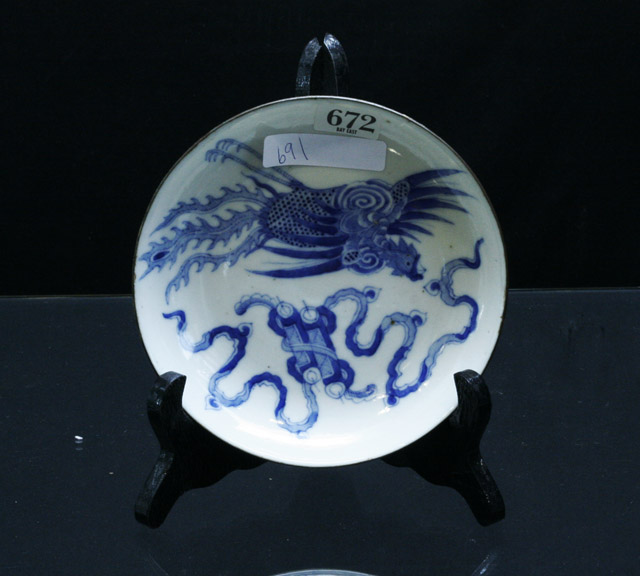 Appraisal: An th century Chinese blue and white tin rimmed plate