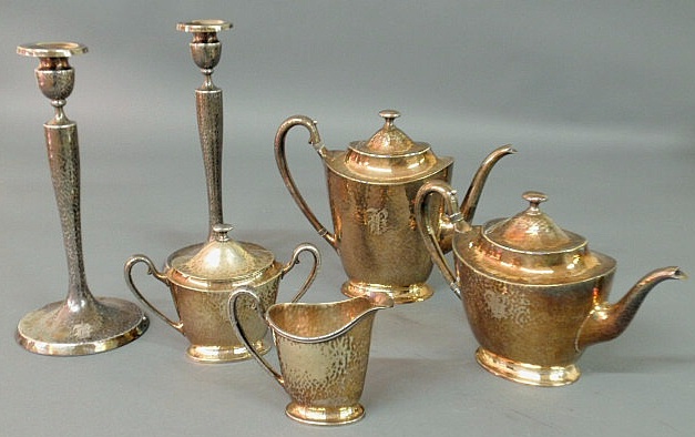 Appraisal: Hammered silverplate tea service and pair of candlesticks by Derby