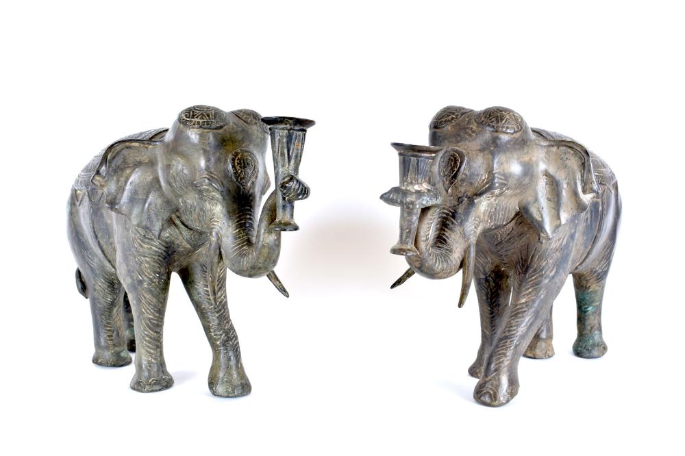 Appraisal: PAIR OF PATINATED BRONZE ELEPHANTS WITH CANDLE HOLDERS th Century