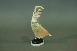 Appraisal: An art deco porcelain statue of a dancer a f