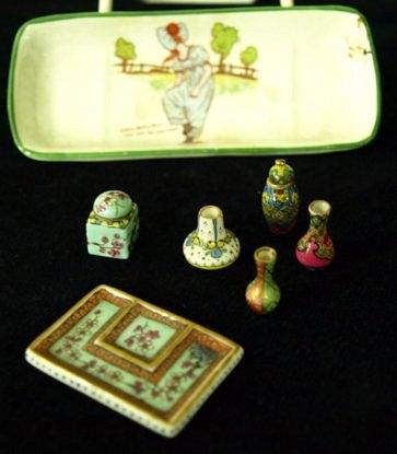 Appraisal: A collection of miniature ceramics including vases etc