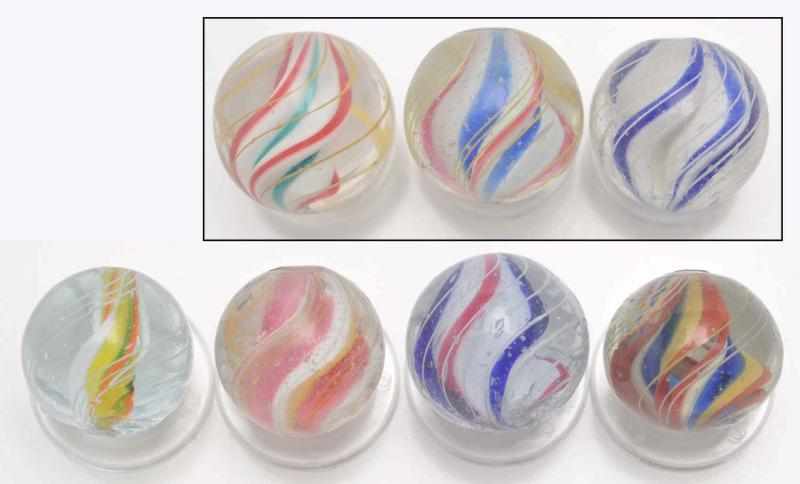 Appraisal: Lot of Ridge Core Swirl Marbles Description Includes seven multicolor