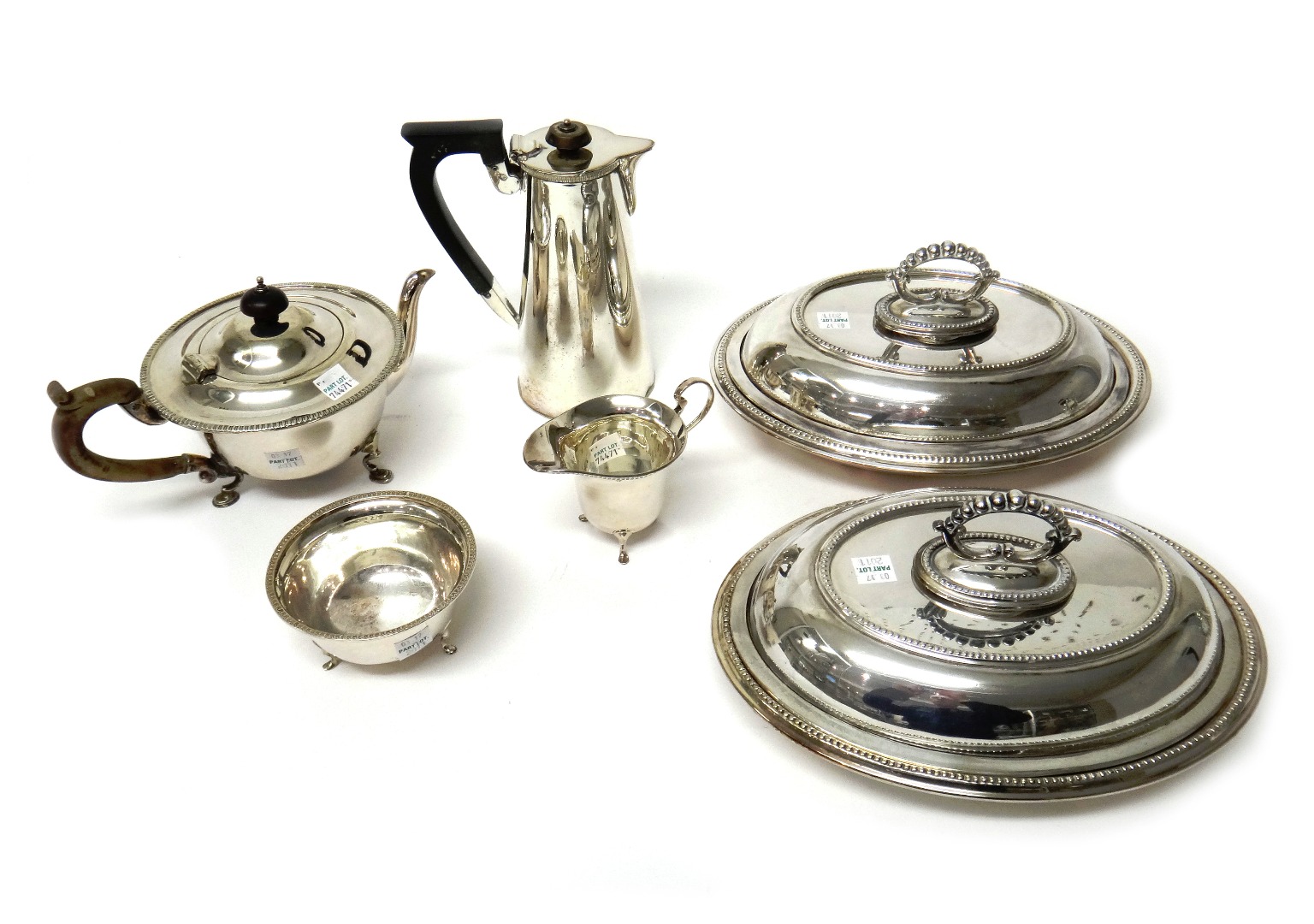 Appraisal: Plated wares comprising a three piece tea set a pair