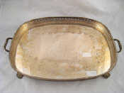 Appraisal: A two handled silver plated tray with gadrooned and pierced