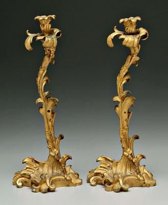 Appraisal: Pair bronze dor candlesticks floral and scroll motifs bases and