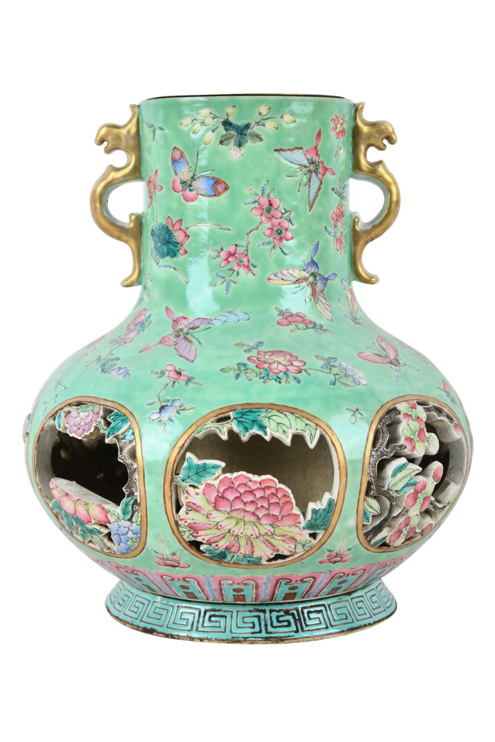 Appraisal: CHINESE FAMILLE ROSE PORCELAIN OPENWORK VASEwith removable metal tube form