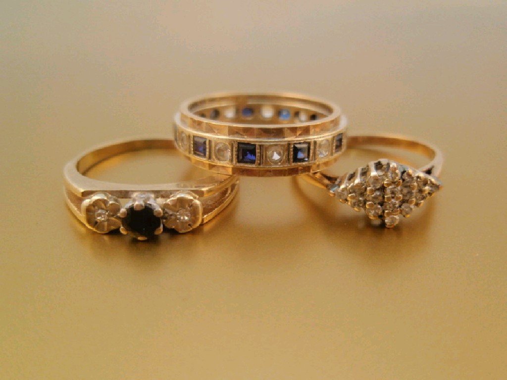 Appraisal: Three stone set dress rings