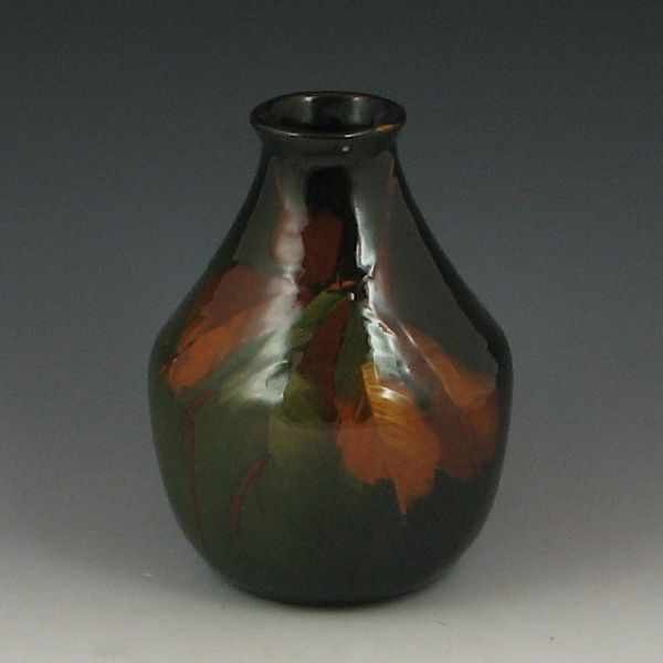 Appraisal: Flower Jug black brown with green and yellow leaf design