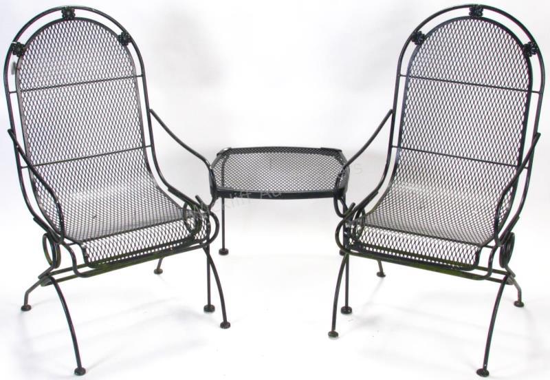 Appraisal: A vintage pair of iron patio chairs with mesh seats