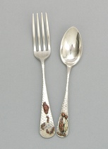 Appraisal: A Pair of Mixed Metals Chased Flatware Pieces by Gorham