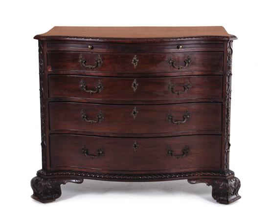 Appraisal: George III carved mahogany bachelor's chest circa serpentine top with