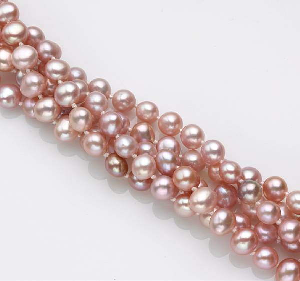 Appraisal: A pink cultured biwa pearl five strand torsade necklace Angela