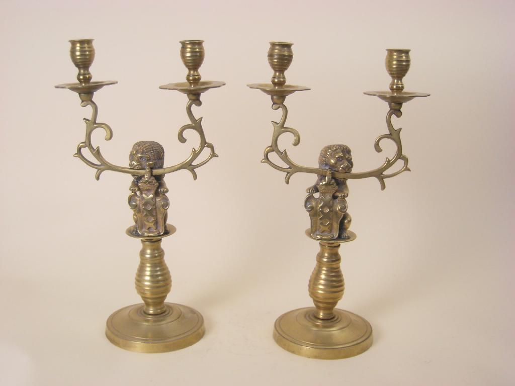 Appraisal: A pair of brass Candlesticks each with a pair of