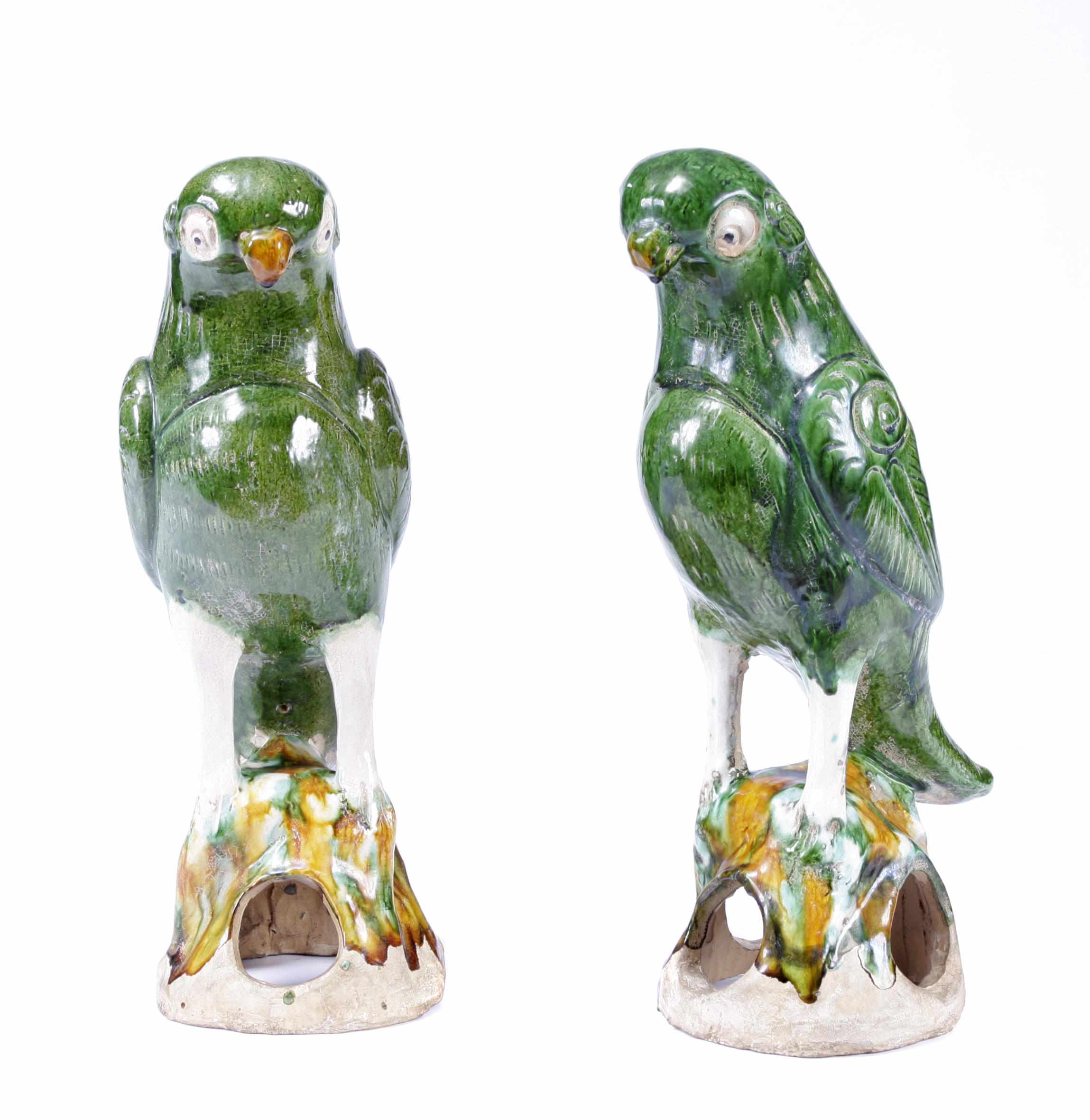 Appraisal: A pair of Chinese glazed ceramic parrots height in diameter