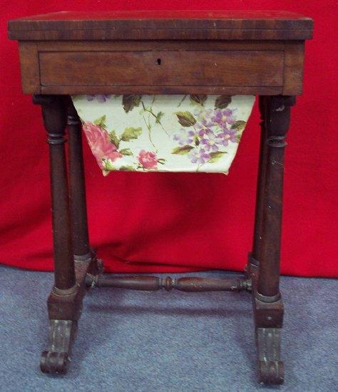 Appraisal: A Victorian mahogany work table the fold over top revealing