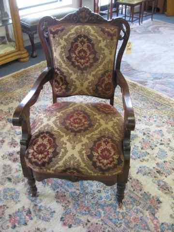 Appraisal: Carved Arm Chair floral brocade