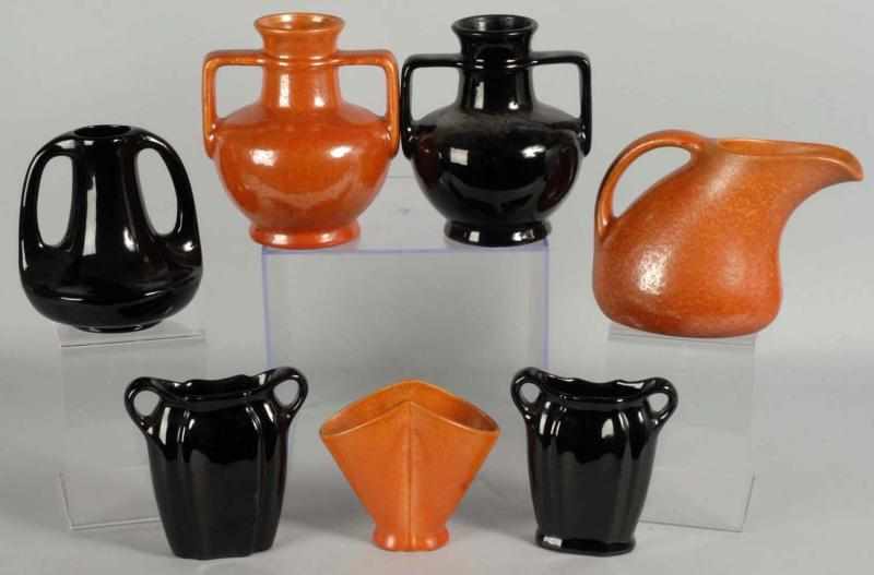 Appraisal: Lot of Muncie Pottery Pieces Description Includes one handled spill