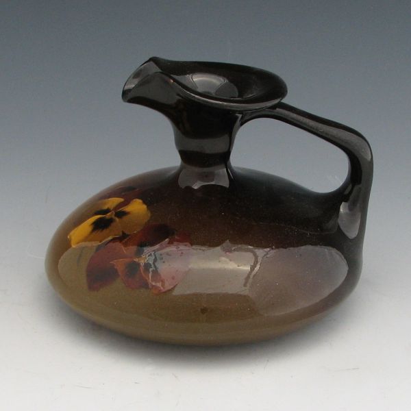 Appraisal: Weller Louwelsa squat ewer with pansy decoration Marked Weller Louwelsa