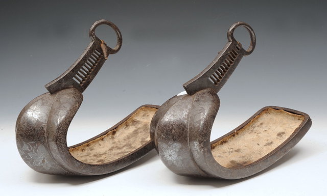 Appraisal: A PAIR OF JAPANESE STEEL AND SILVER STIRRUPS Edo period