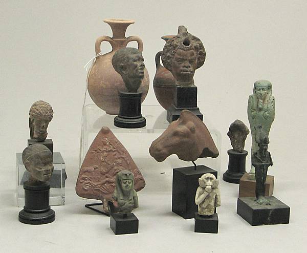 Appraisal: An assembled grouping antiquities Comprising seven Egyptian composition figures and