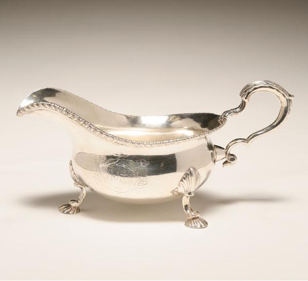 Appraisal: George III sterling silver sauceboat with naval engraving on the