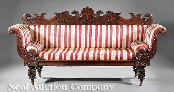 Appraisal: A William IV Carved Mahogany Sofa c elaborately carved crest