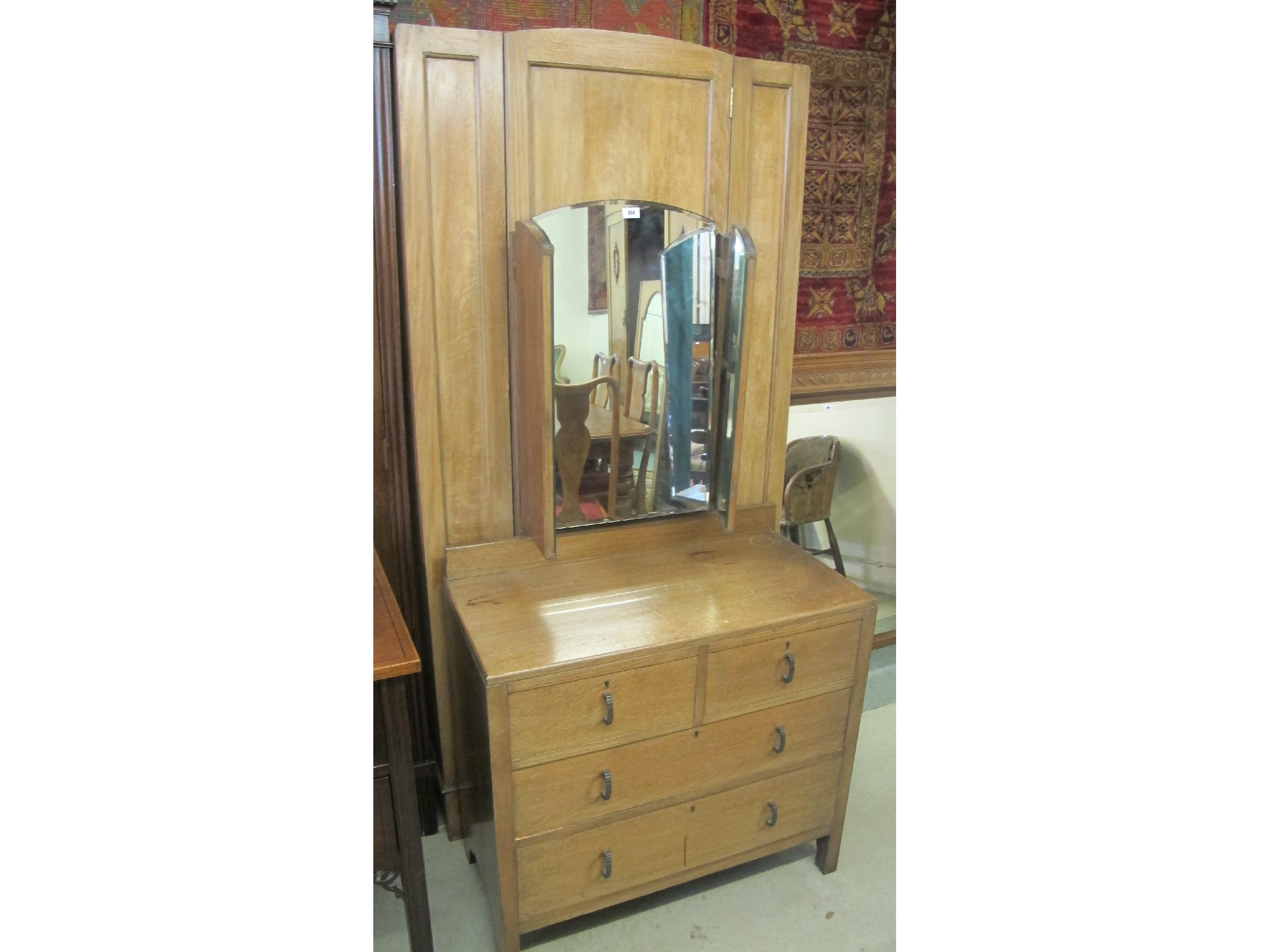 Appraisal: An oak wardrobe mirrored back dresser nest of tables chair