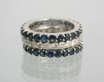 Appraisal: Three Eternity Bands with Diamonds and Sapphires Three eternity rings