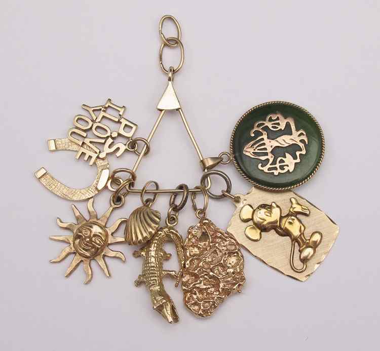 Appraisal: ESTATE GOLD CHARMS INCL MICKEY MOUSE Lot of eight K