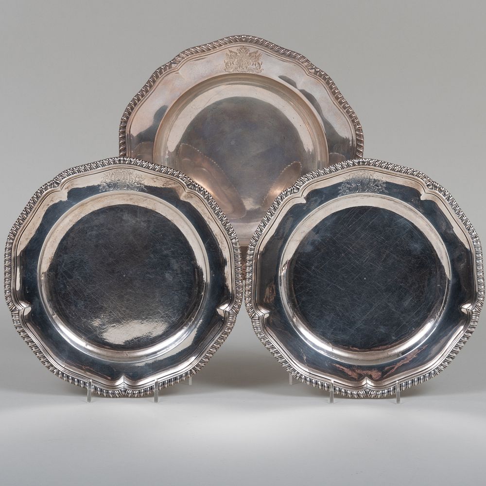 Appraisal: Three English Silver Plates Comprising A pair of plates mark