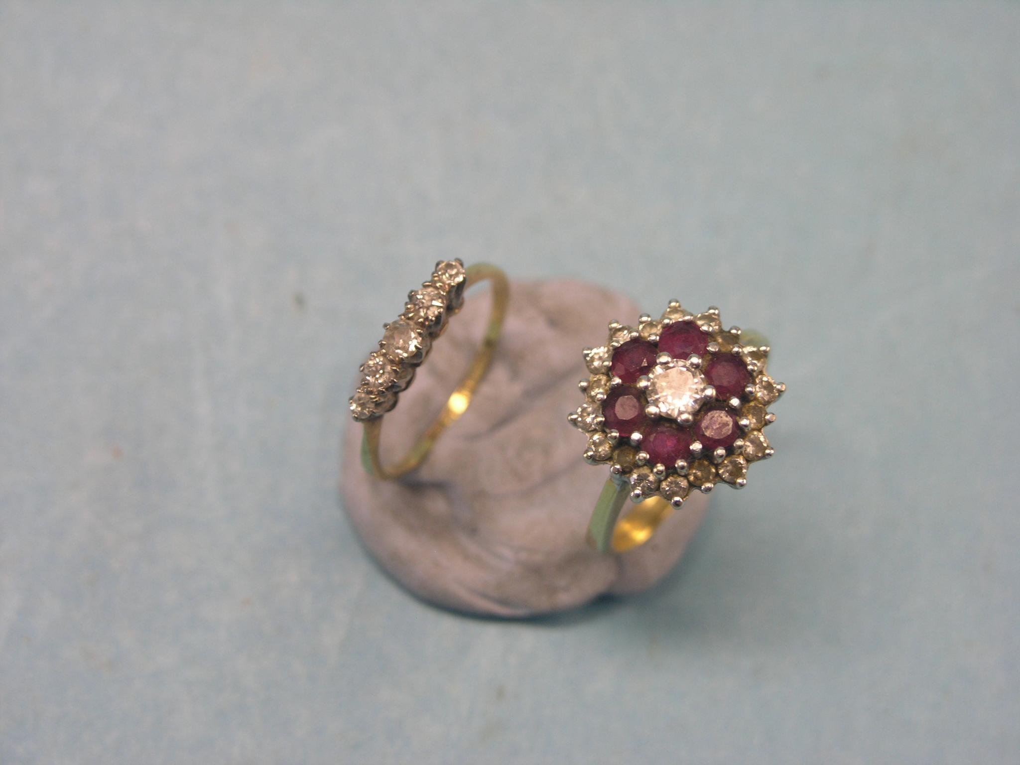 Appraisal: A diamond and ruby cluster ring claw-setting and ct gold