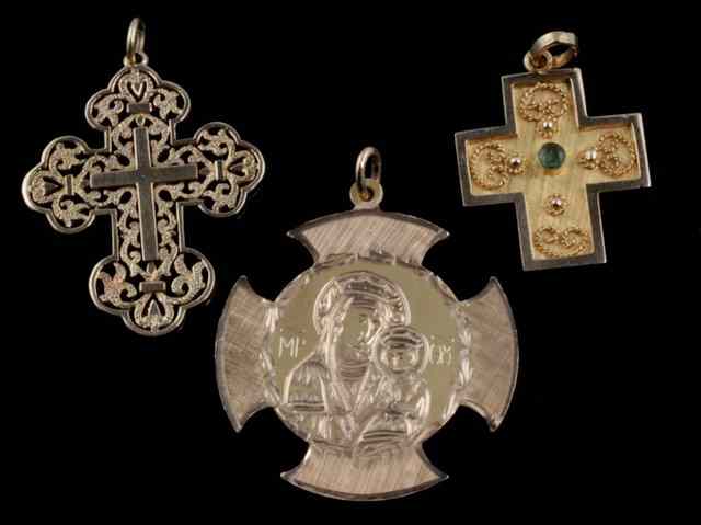 Appraisal: An ct gold cross of flat pierced form and two