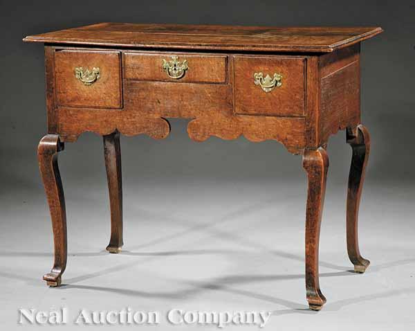 Appraisal: A George II Oak Dressing Table th c molded top