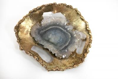 Appraisal: A geode crystal brooch of modern design the irregularly shaped