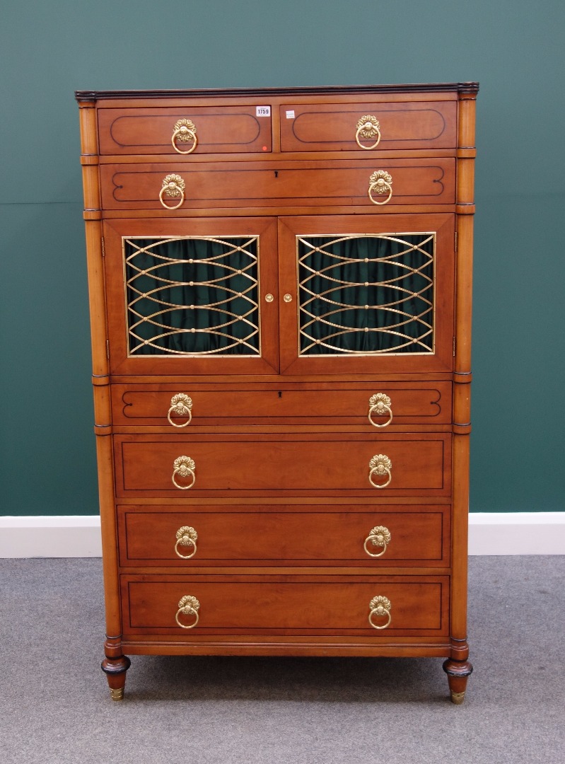 Appraisal: An early th century American satinwood side cabinet with two