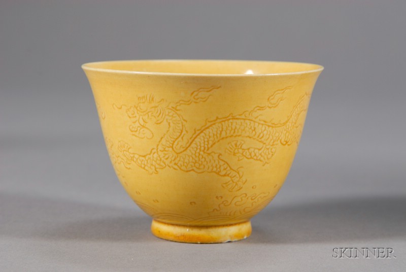 Appraisal: Yellow Porcelain Cup China th century egg yolk yellow color