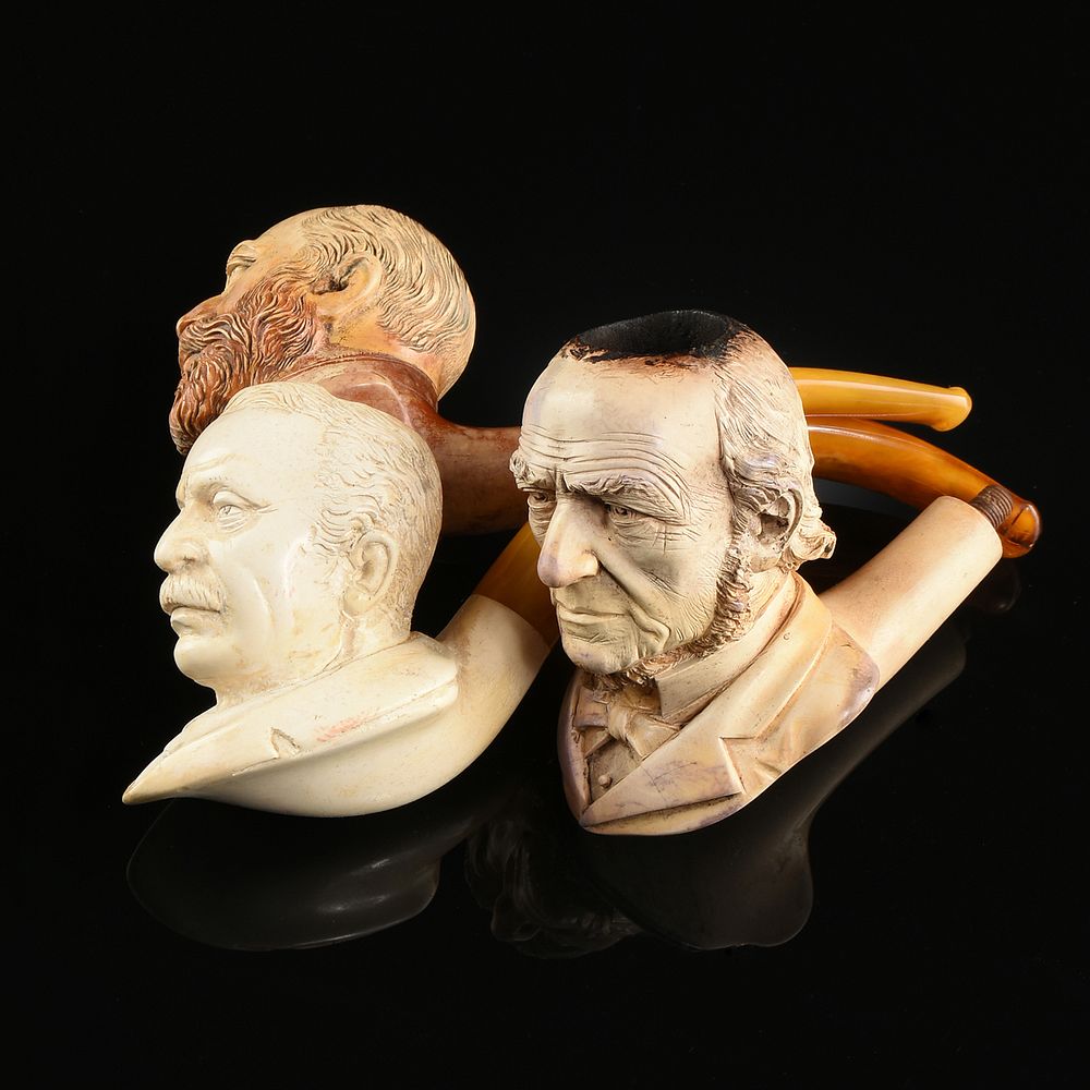 Appraisal: A GROUP OF SEVEN ANGLO-AUSTRIAN CARVED MEERSCHAUM PIPES LATE TH