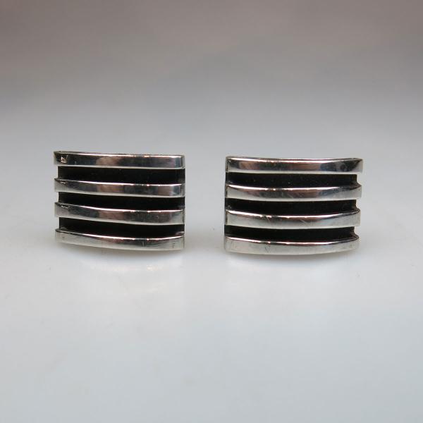 Appraisal: Pair Of Sigi Pineda Mexican Sterling Silver Cufflinks with incised