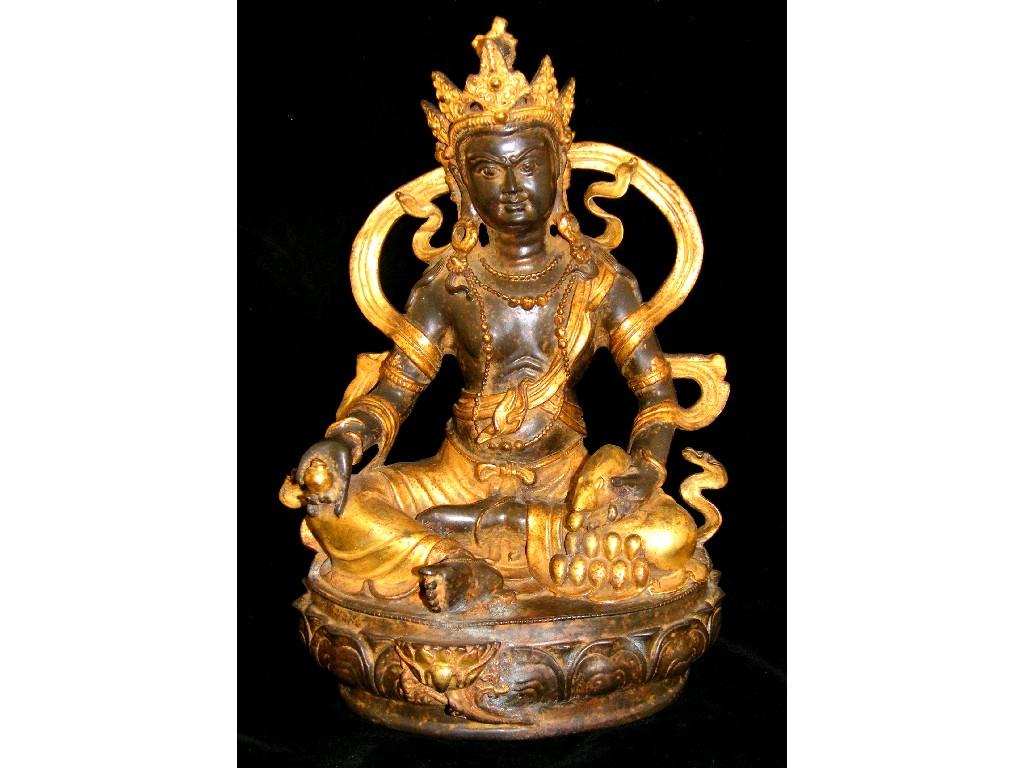 Appraisal: Gilt metal bronzed figure of a Buddha modelled seated wearing