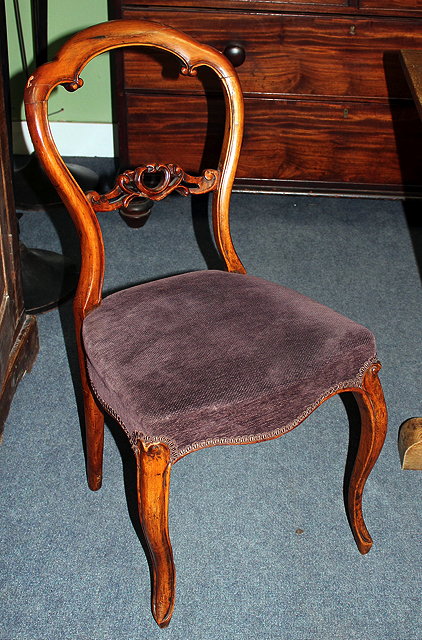 Appraisal: A SET OF SIX VICTORIAN HOOP BACK CARVED WALNUT DINING