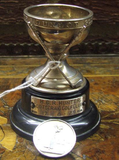 Appraisal: A GOLFING SILVER TROPHY the 'Dunlop Golf Ball Hole-In-One' souvenir