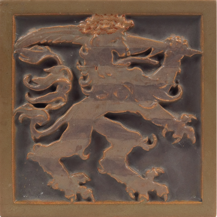 Appraisal: Rookwood Faience tile carved lion in a brown matte glaze