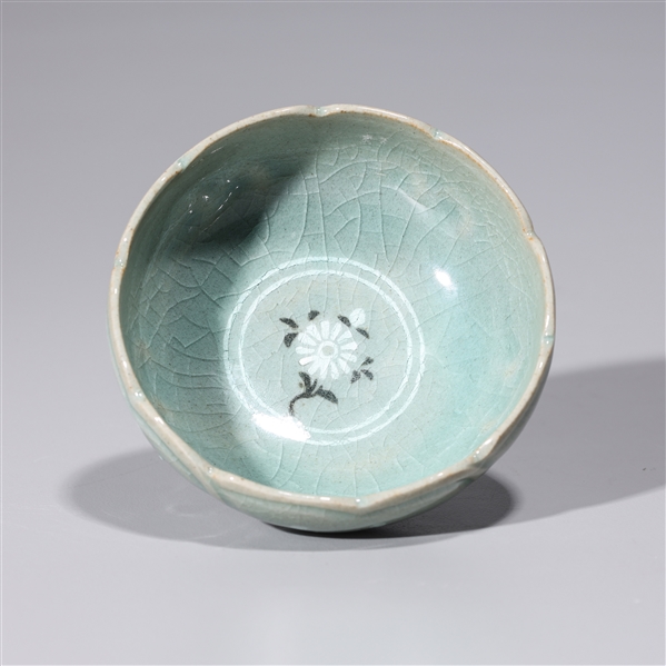 Appraisal: Korean celadon glazed wine cup with floral designs to interior