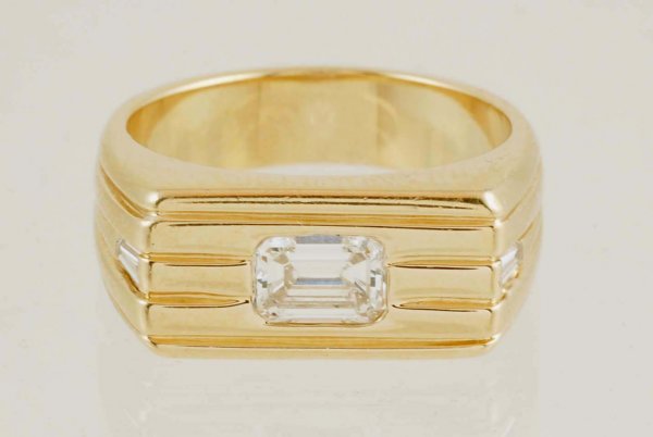 Appraisal: Man's diamond fashion ring in K yellow gold Center bezel