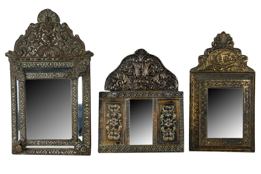 Appraisal: THREE REPOUSSE BRASS-CLAD WALL MIRRORSthe first x inches the second