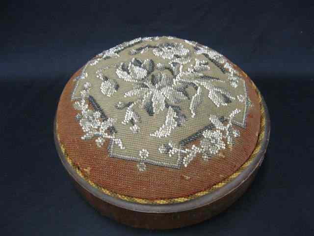 Appraisal: Victorian Needlepoint Footstool beaded floral trim '' diameter tri-footed